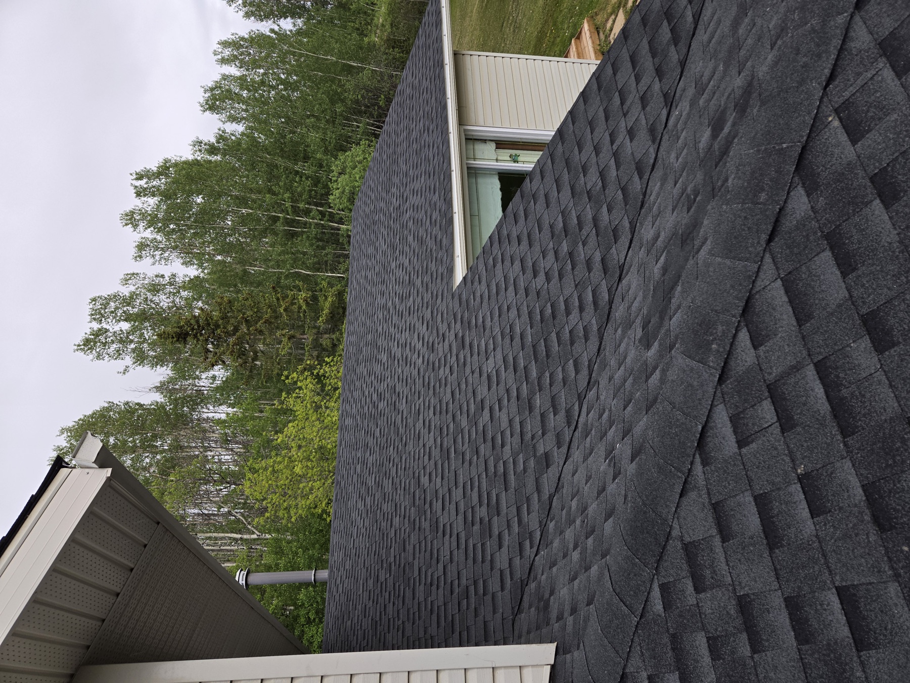 Dark shingle roof Farmington BC — Sunnybrook Roofing